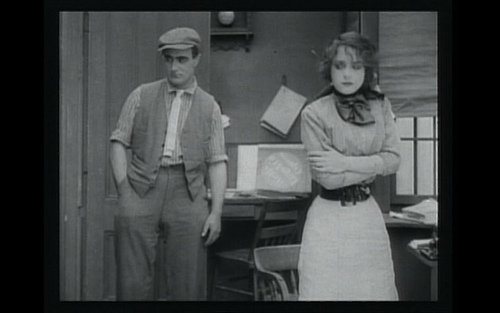 Dorothy Bernard and Wilfred Lucas share an awkward moment in "The Girl and Her Trust"