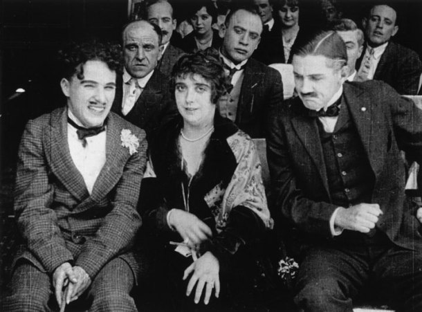 Charllie Chaplin and Mabel Normand in "Tillie's Punctured Romance"