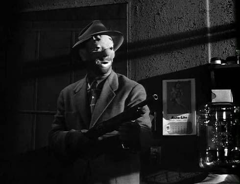 Kind of reminds me of the beginning of "The Dark Knight"... or "Point Break" minus the Presidents masks.