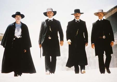 Doc Holliday and the Earp Boys stroll to the O.K. Corral, Reservoir Dogs-style.